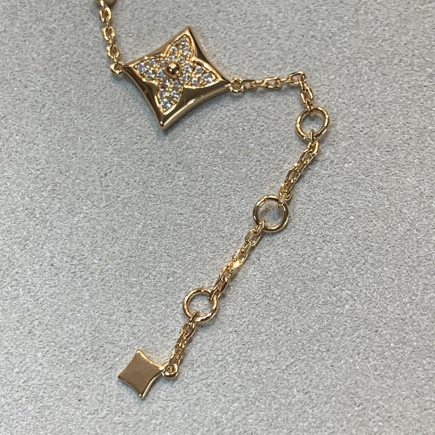 DIANA STAR AND SUN 4 MOTIFS GOLD DIAMONDS BRACELET