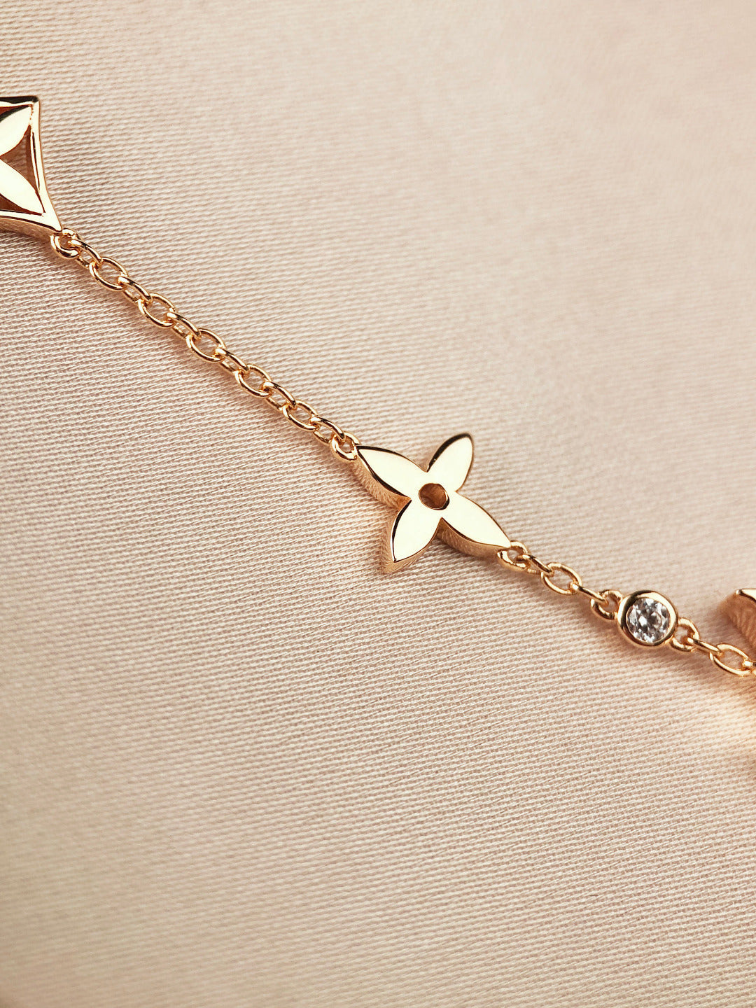 DIANA STAR AND SUN 7 MOTIFS GOLD BRACELET