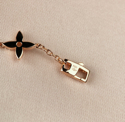 DIANA STAR AND SUN 7 MOTIFS GOLD BRACELET