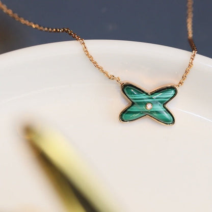 Collier en or rose et malachite Diana Jeux avec un diamant