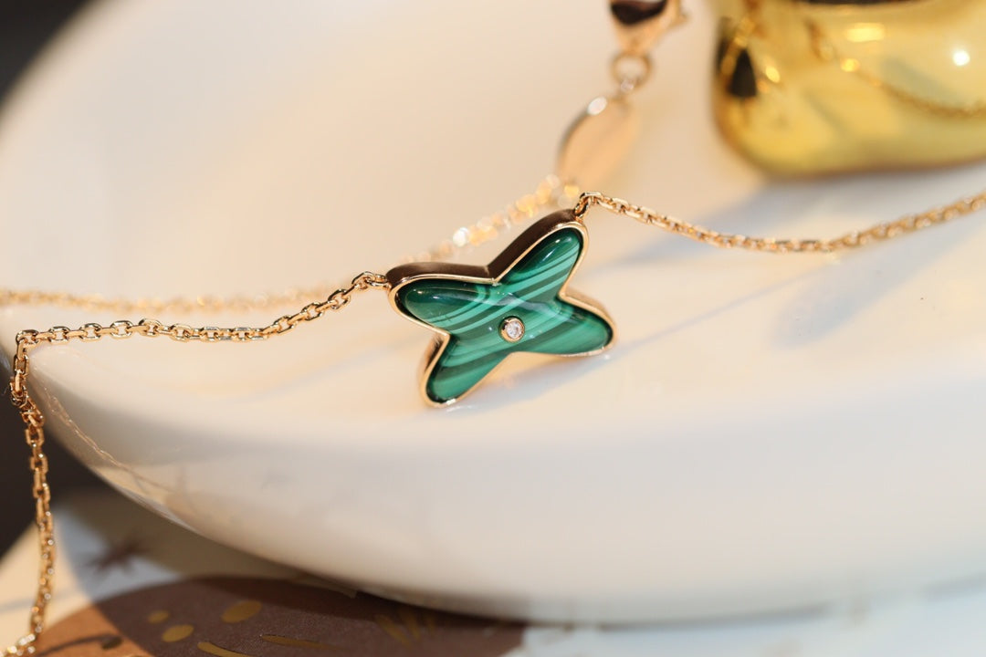 Collier en or rose et malachite Diana Jeux avec un diamant