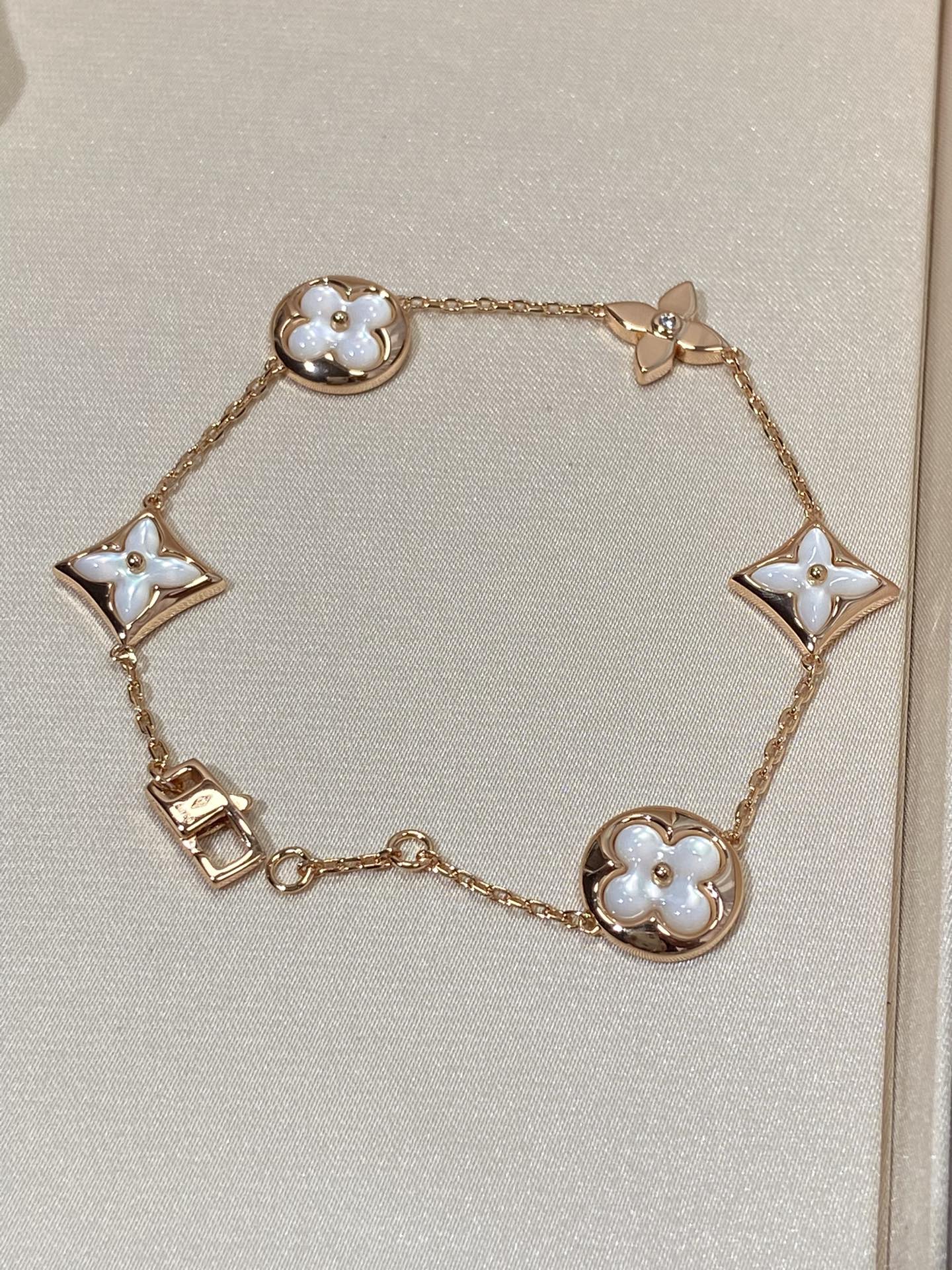DIANA STAR AND SUN 5 MOTIF MOP PINK GOLD BRACELET