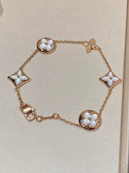 DIANA STAR AND SUN 5 MOTIF MOP PINK GOLD BRACELET