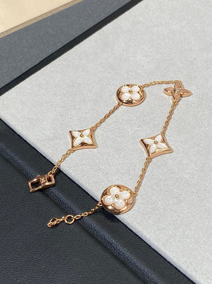 DIANA STAR AND SUN 5 MOTIF MOP PINK GOLD BRACELET
