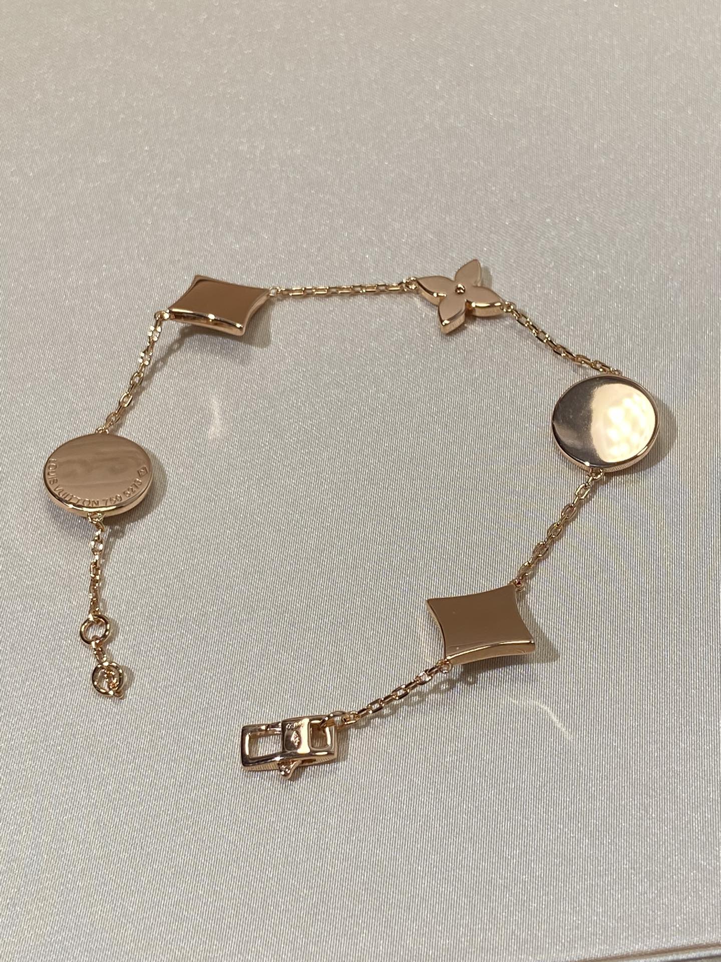 DIANA STAR AND SUN 5 MOTIF MOP PINK GOLD BRACELET