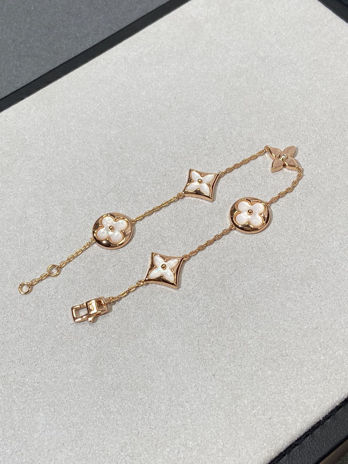 DIANA STAR AND SUN 5 MOTIF MOP PINK GOLD BRACELET