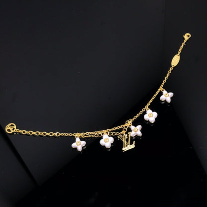 DIANA LOGO 6 MOTIF STAR AND SUN GOLD BRACELET