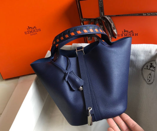 HM PICOTIN LOCK 18 NAVY EPSOM WITH BRAID STRAP