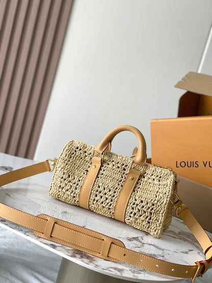 KEEPALL BANDOULI¨¨RE 25 IN BEIGE CROCHETED RAFFIA AND CALFSKIN TRIM