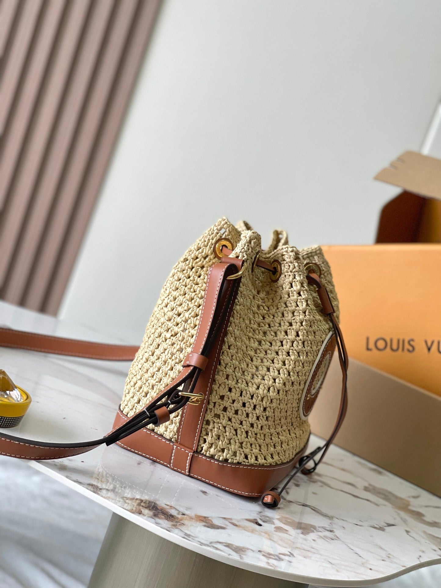 NO¨¦ PURSE 24 IN BEIGE CROCHETED RAFFIA AND BROWN CALFSKIN TRIM