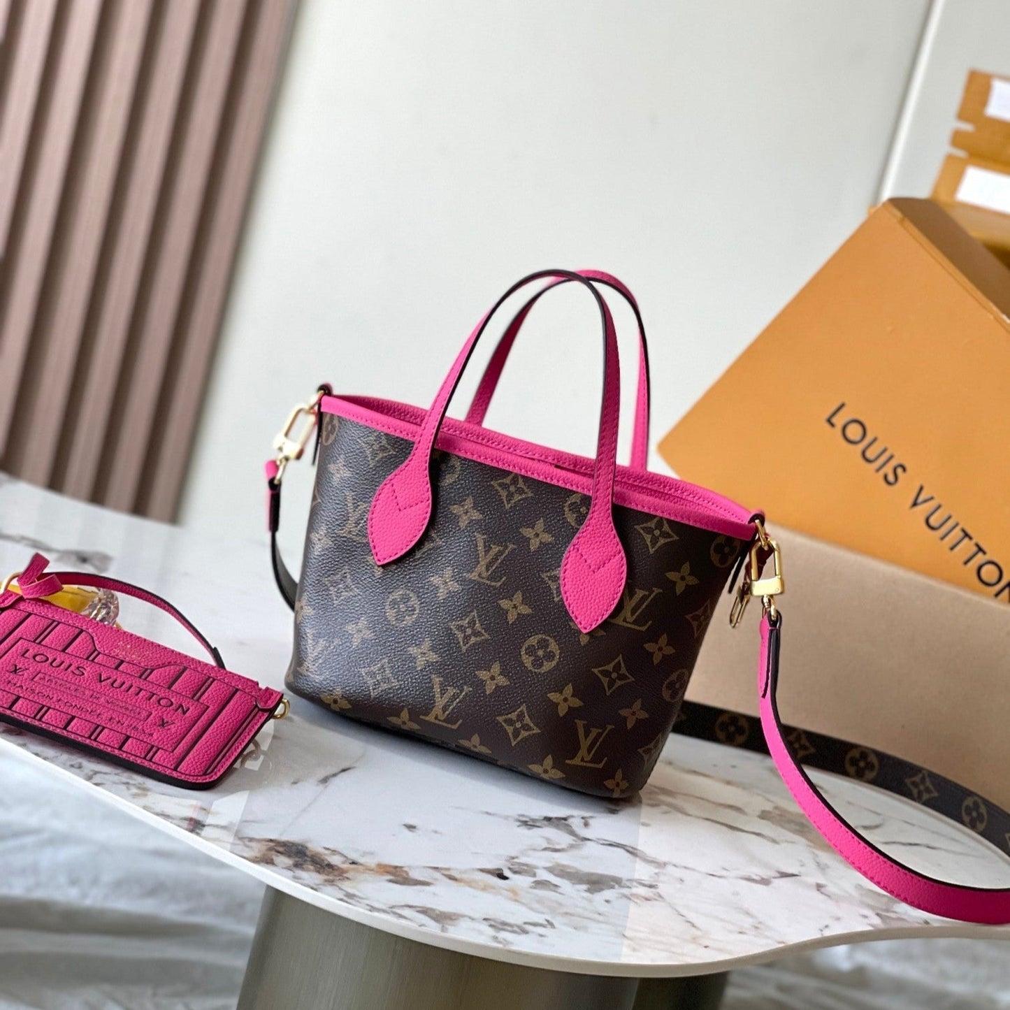 NEVERFULL BANDOULI¨¨RE INSIDE OUT BB 24 IN BROWN MONOGRAM CANVAS AND PINK CALFSKIN
