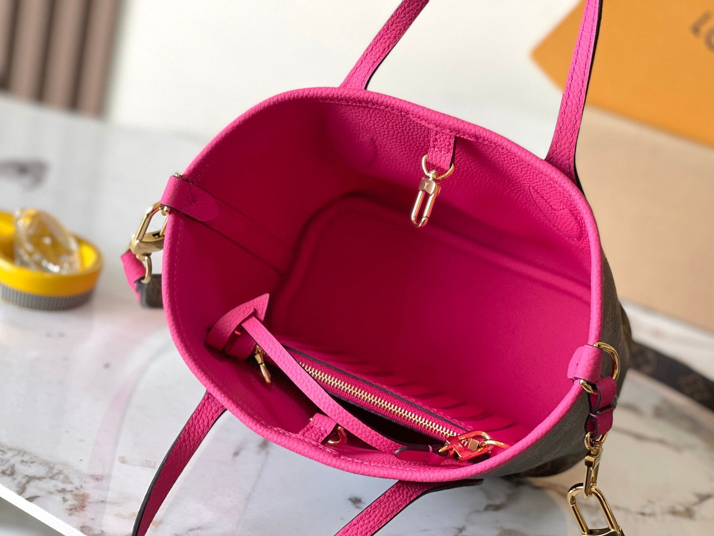 NEVERFULL BANDOULI¨¨RE INSIDE OUT BB 24 IN BROWN MONOGRAM CANVAS AND PINK CALFSKIN