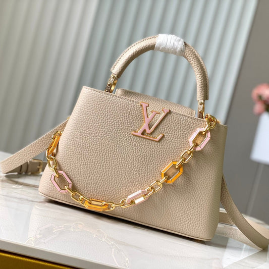 CAPUCINES BB 27CM BEIGE TAURILLON LEATHER