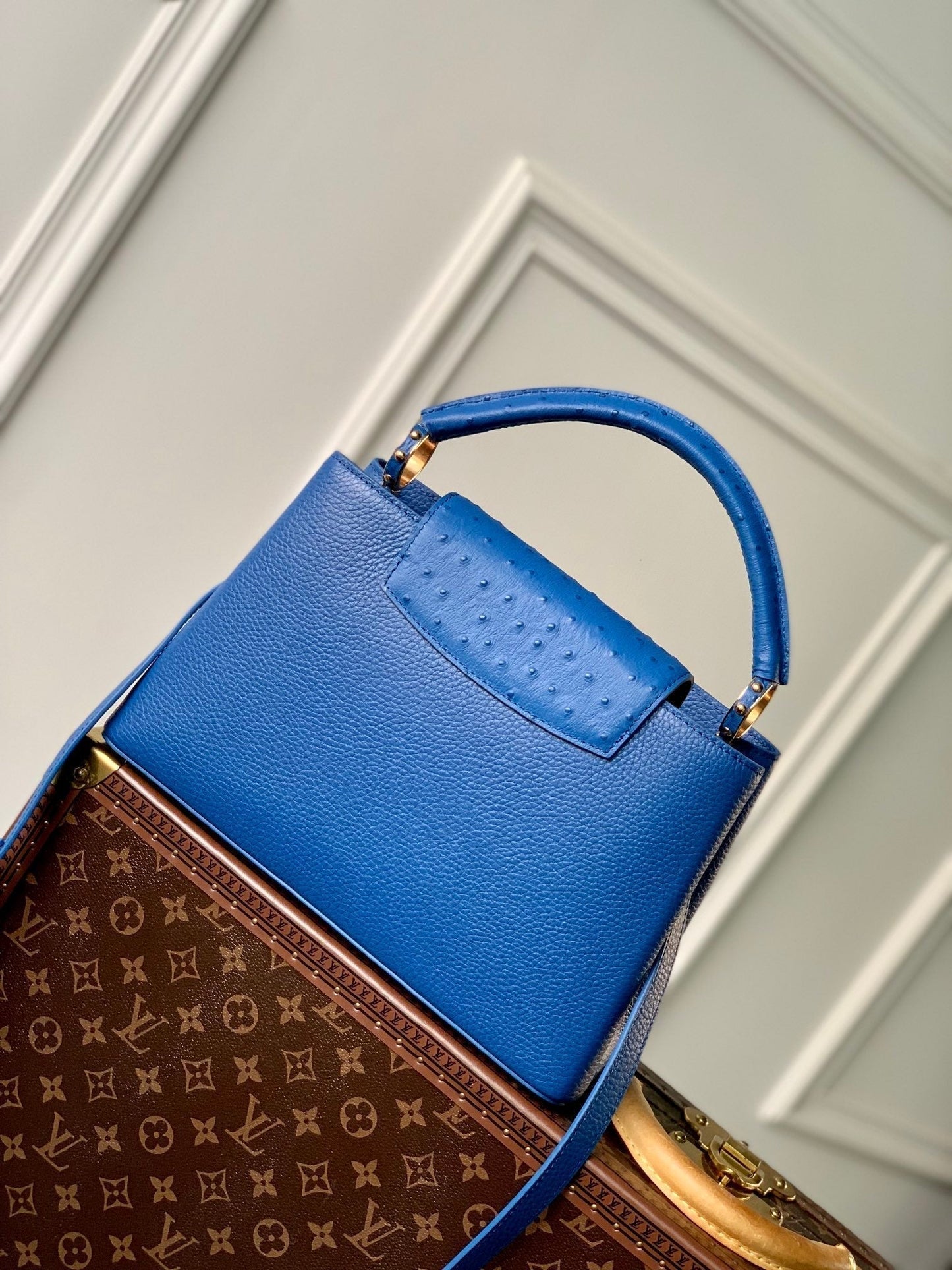 capucines mm 31.5 cobalt blue taurillon leather gold hardware