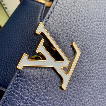 capucines mm 31.5 dark blue taurillon leather gold hardware