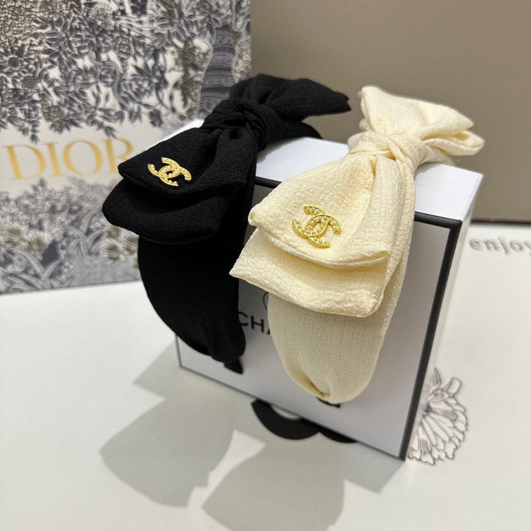 BLACK FABRIC HEADBAND WITH BOW 168569