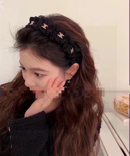 BLACK FABRIC WITH GOLD LOGO HAIRBAND 415931