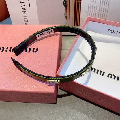 HEAD BAND IN OLIVE GREEN LAMBSKIN AND RESIN 417298