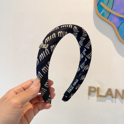 THICK HAIR BAND IN NAVY BLUE KINITTED FABRIC 420636