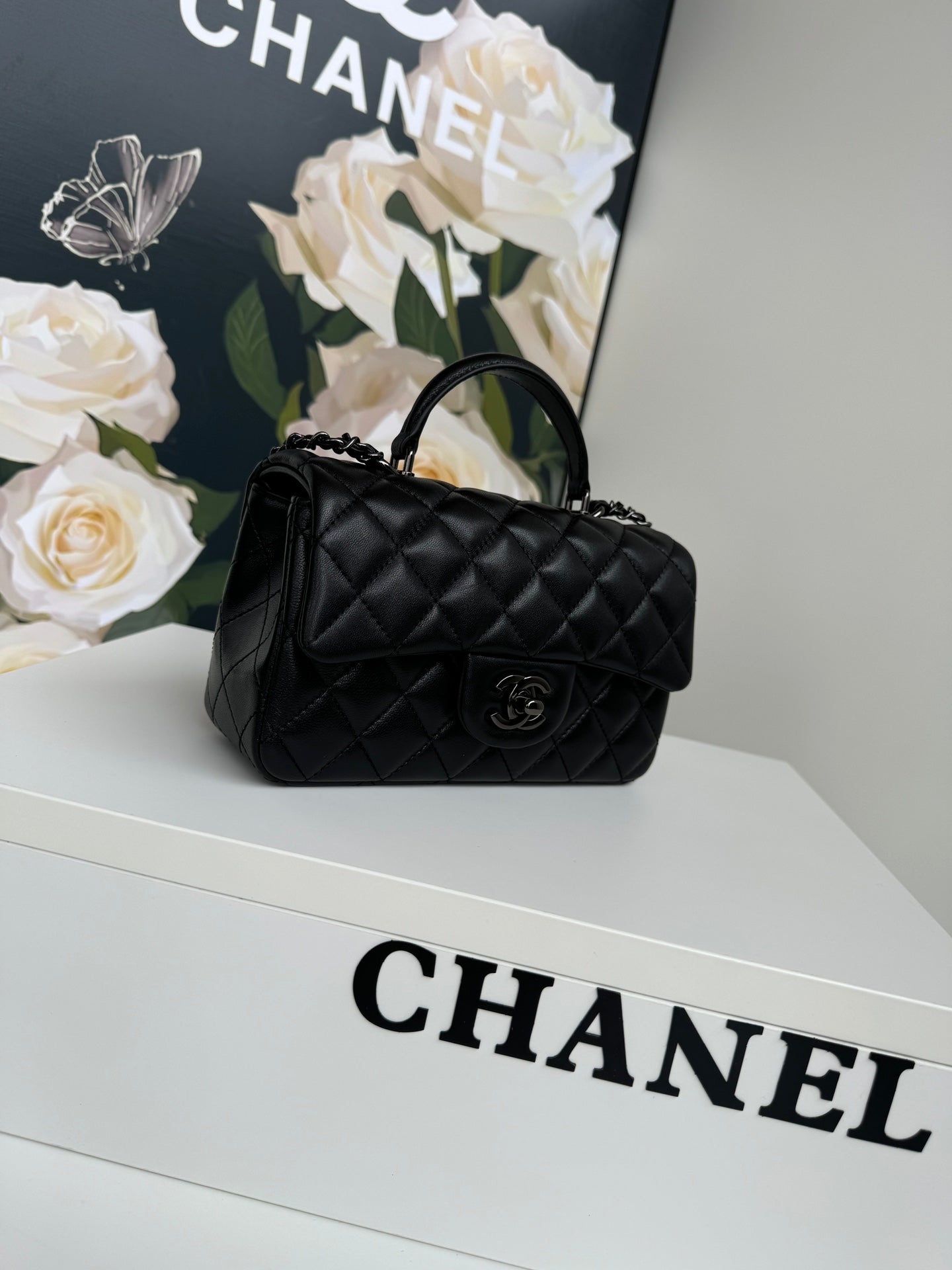 24c mini flap bag 20cm with top handle all black calfskin